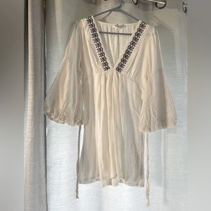 Light cover up or see through dress